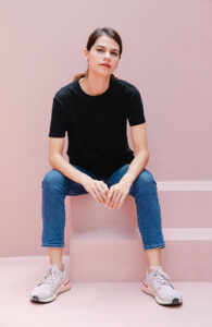 woman-casual-black-shirt-sitting-steps__opdb-op62bf6451d0bec8-60850189